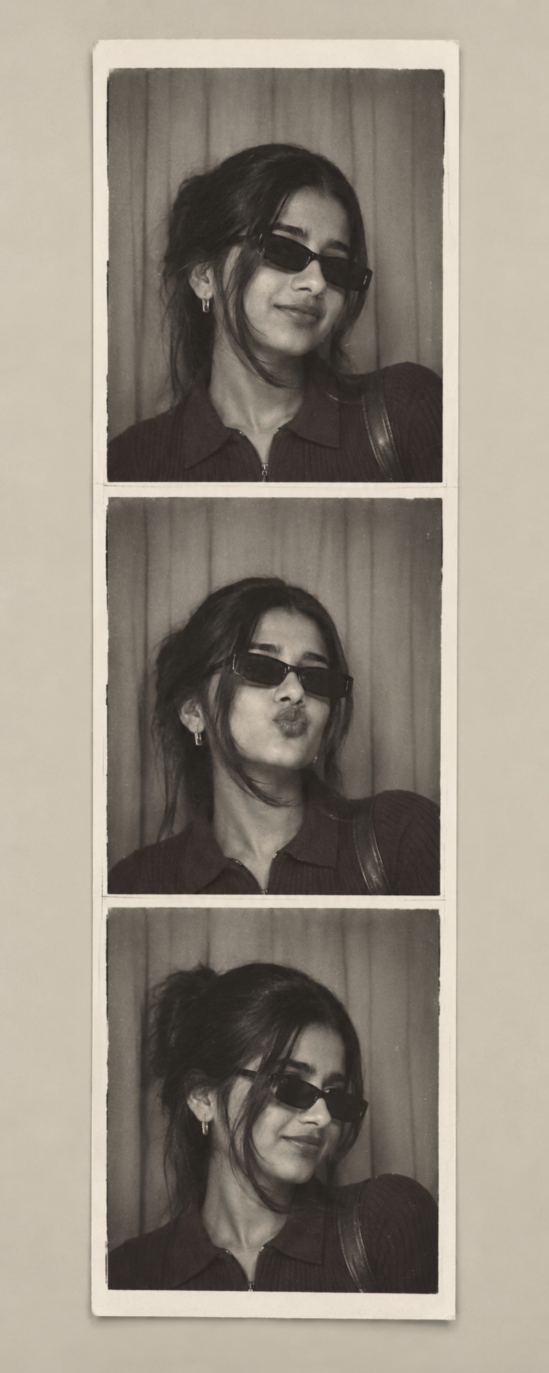 Photo booth strip of black and white portraits