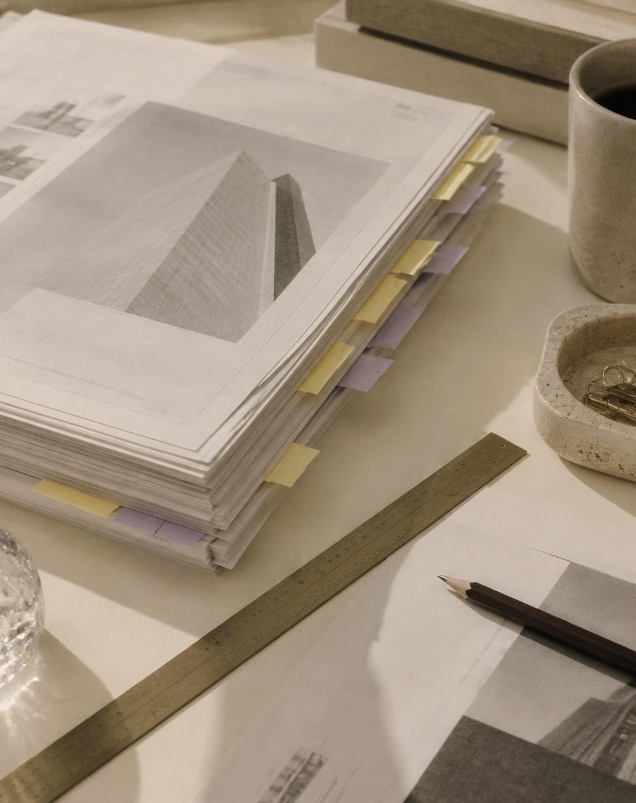A tabbed stack of technical specification documents